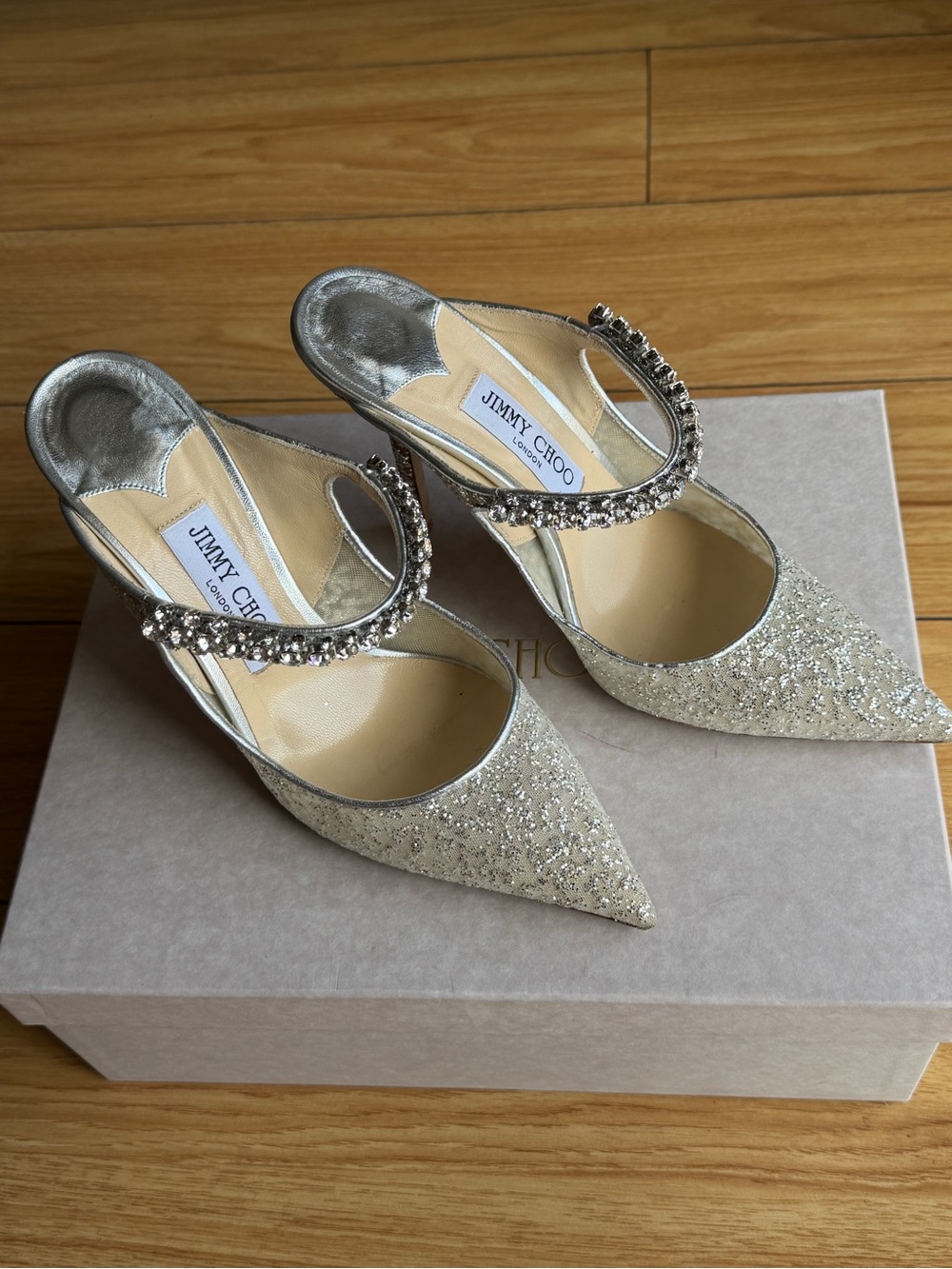 Jimmy Choo Silver Glitter Pointed Slingback Pump. Bing 100.